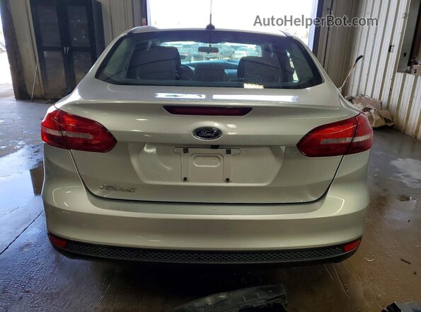 1FADP3E21HL328083 2017 FORD FOCUS Silver Vista trasera