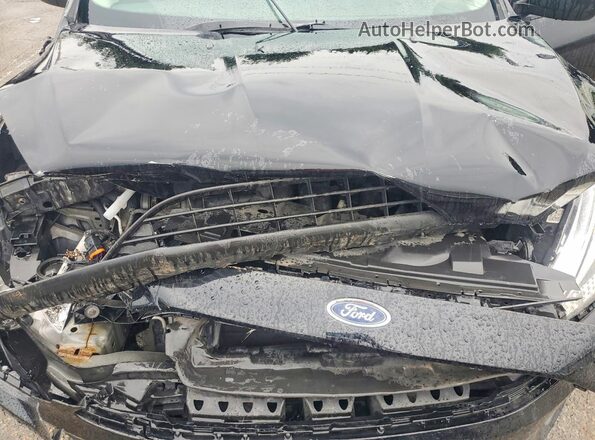1FADP3E22HL327637 2017 FORD FOCUS Black Rear interior view