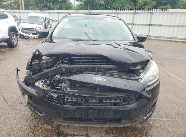 1FADP3E22HL327637 2017 FORD FOCUS Black Front view