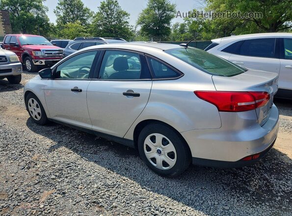 1FADP3E22HL338959 2017 FORD FOCUS Silver Trasero izquierdo