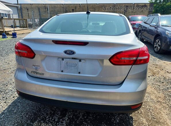1FADP3E22HL338959 2017 FORD FOCUS Silver Vista trasera