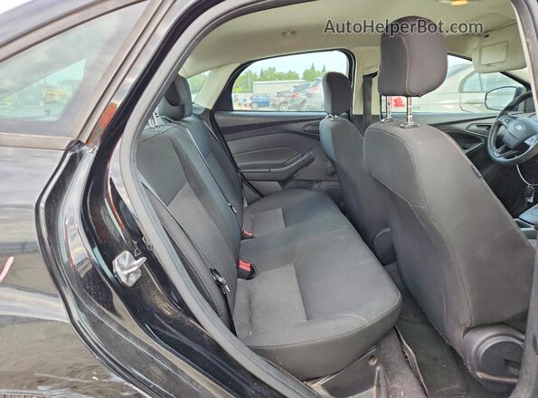 1FADP3E2XGL388104 2016 FORD FOCUS Black Vista de los asientos traseros