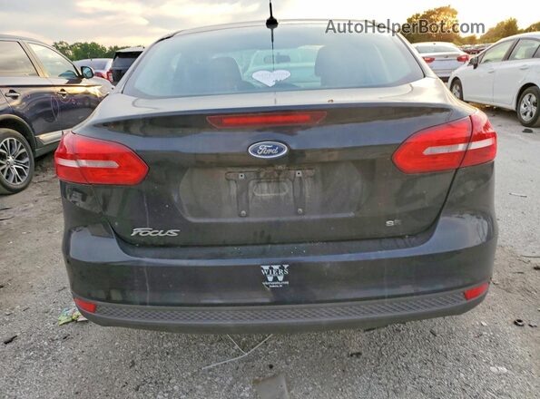1FADP3F20GL211950 2016 FORD FOCUS Black Вид ззаду