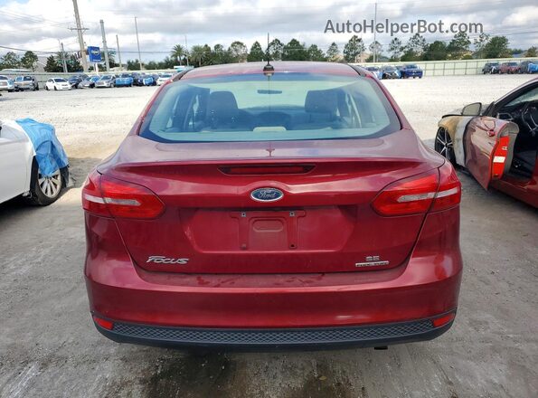 1FADP3F20GL215402 2016 FORD FOCUS Burgundy Rear view