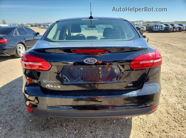 1FADP3F20HL293356 2017 FORD FOCUS Black უკანა ხედი