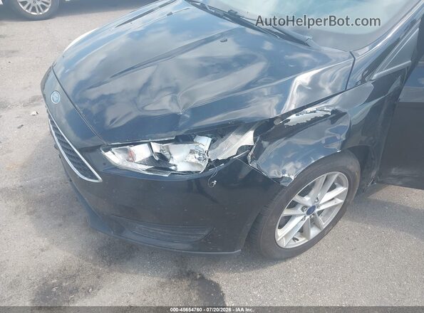1FADP3F20HL301715 2017 FORD FOCUS Black Вид спереду