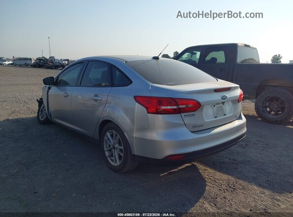 1FADP3F20JL302904 2018 FORD FOCUS Silver Trasero izquierdo