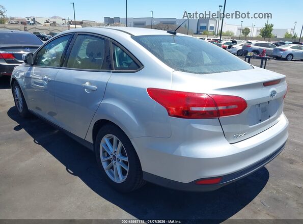 1FADP3F20JL313028 2018 FORD FOCUS Silver Rear left