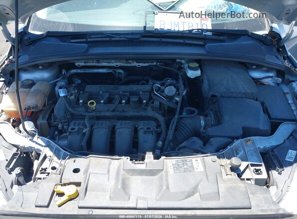 1FADP3F20JL313028 2018 FORD FOCUS Silver Rear view