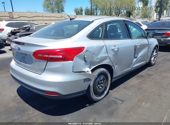 1FADP3F20JL313028 2018 FORD FOCUS Silver Rear right