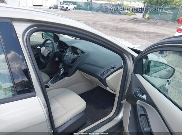 1FADP3F21GL210564 2016 FORD FOCUS Champagne Вид салону спереду