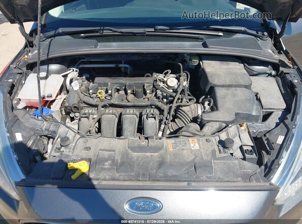 1FADP3F21GL400042 2016 FORD FOCUS Gray Widok z tyłu