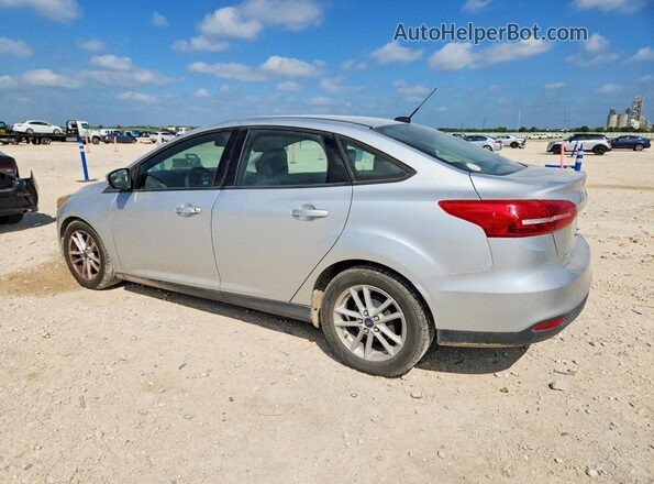 1FADP3F21HL320189 2017 FORD FOCUS Silver Trasero izquierdo