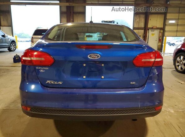 1FADP3F21JL228022 2018 FORD FOCUS Blue Rear view