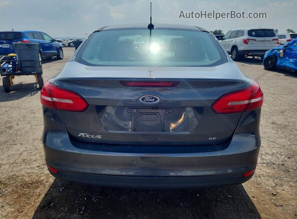 1FADP3F21JL255060 2018 FORD FOCUS Silver Widok z tyłu