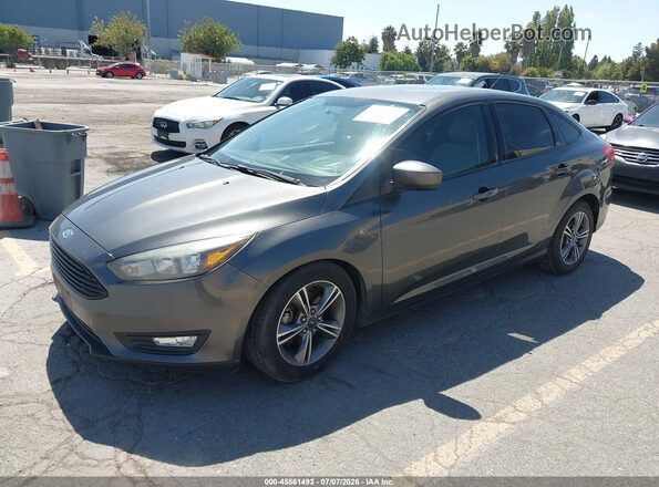 1FADP3F21JL288088 2018 FORD FOCUS Gray Առջևի ձախ երեք քառորդ տեսարան