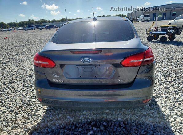 1FADP3F22HL243090 2017 FORD FOCUS Silver Rear view