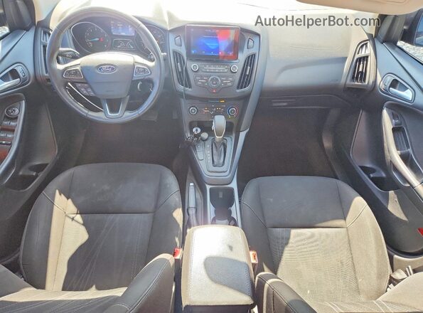 1FADP3F22HL243090 2017 FORD FOCUS Silver Dashboard view