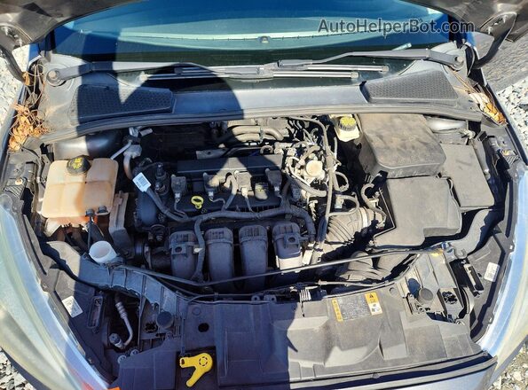 1FADP3F22HL243090 2017 FORD FOCUS Silver Rear interior view