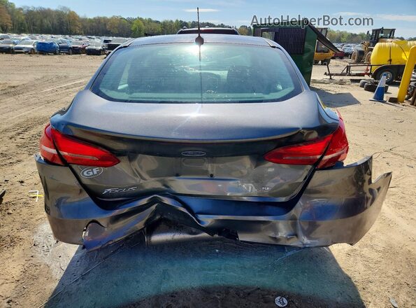 1FADP3F23GL228242 2016 FORD FOCUS Charcoal Rear view