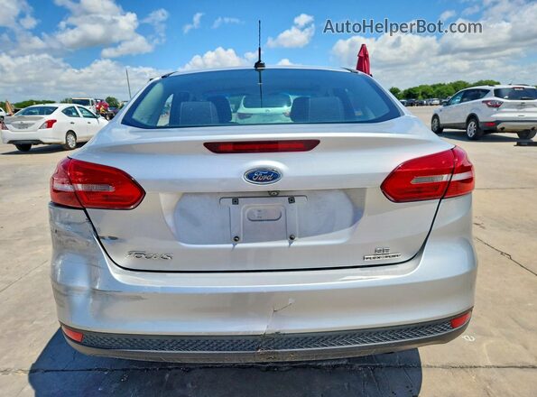 1FADP3F23GL376276 2016 FORD FOCUS Silver Rear view