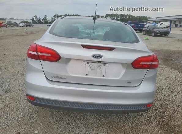 1FADP3F23JL326856 2018 FORD FOCUS Silver უკანა ხედი