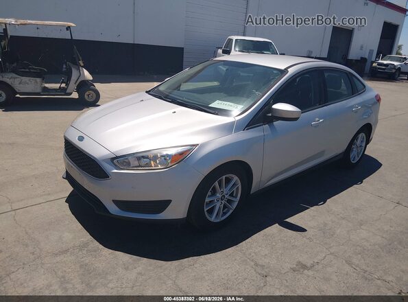 1FADP3F23JL328607 2018 FORD FOCUS Silver Առջևի ձախ երեք քառորդ տեսարան