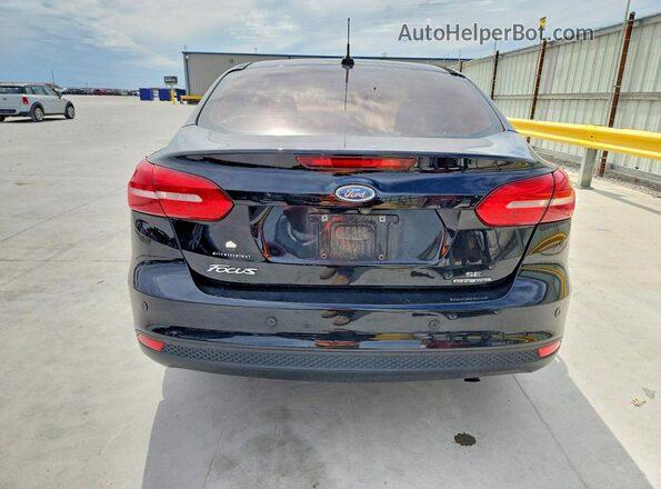 1FADP3F24GL220165 2016 FORD FOCUS Black უკანა ხედი