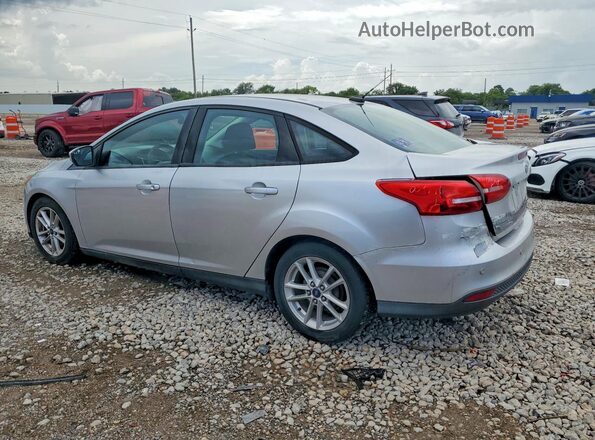 1FADP3F24GL276994 2016 FORD FOCUS Silver Trasero izquierdo