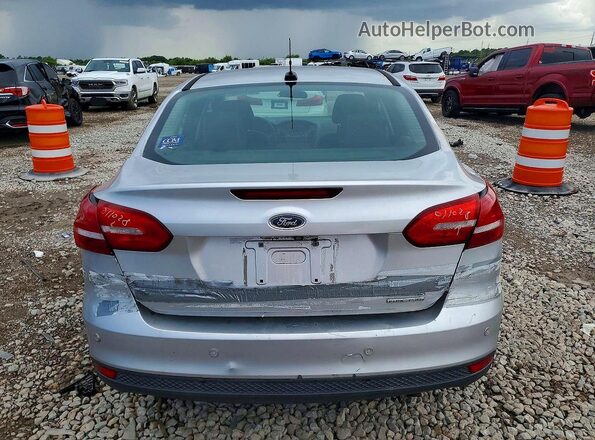 1FADP3F24GL276994 2016 FORD FOCUS Silver Vista trasera