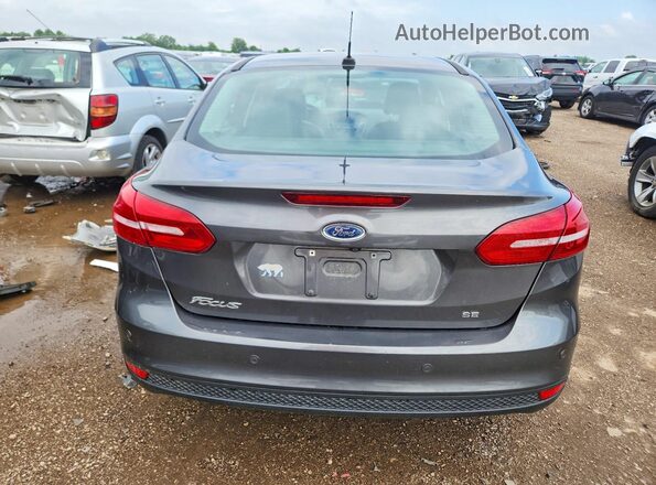 1FADP3F24GL286022 2016 FORD FOCUS Gray Rear view