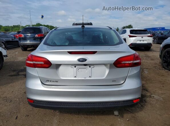 1FADP3F24HL225772 2017 FORD FOCUS Серебряный Вид сзади