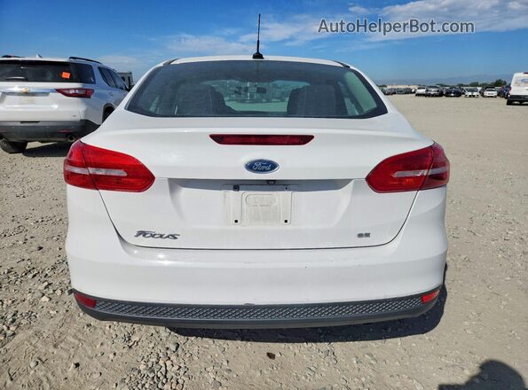 1FADP3F24HL233130 2017 FORD FOCUS White Rear view