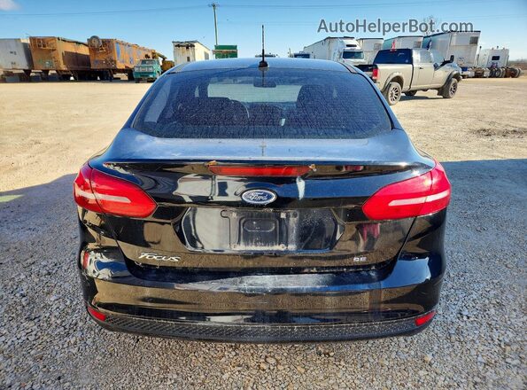 1FADP3F24HL268718 2017 FORD FOCUS Black უკანა ხედი