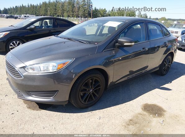 1FADP3F24HL304455 2017 FORD FOCUS Gray Vista tres cuartos delantera izquierda