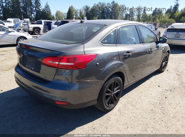 1FADP3F24HL304455 2017 FORD FOCUS Gray Trasero derecho