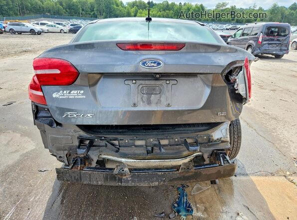 1FADP3F24HL315679 2017 FORD FOCUS Серый Вид сзади