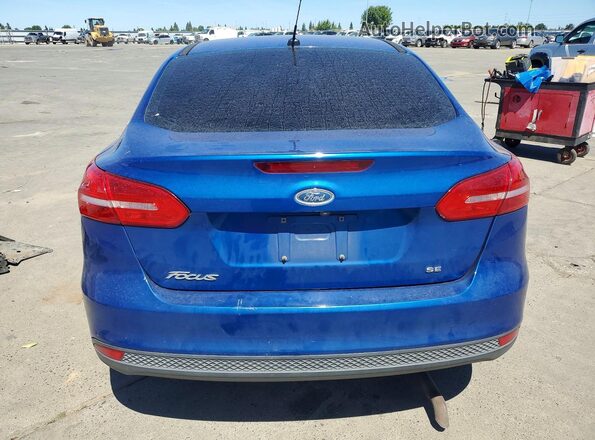 1FADP3F24JL230914 2018 FORD FOCUS Blue Rear view