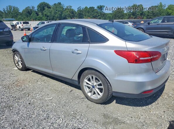 1FADP3F24JL250807 2018 FORD FOCUS Silver Rear left