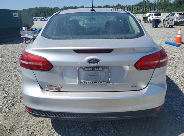 1FADP3F24JL250807 2018 FORD FOCUS Silver Rear view