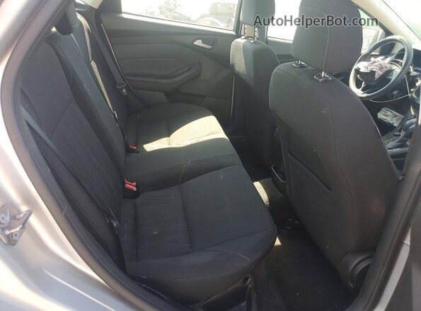 1FADP3F24JL250807 2018 FORD FOCUS Silver Rear seats view