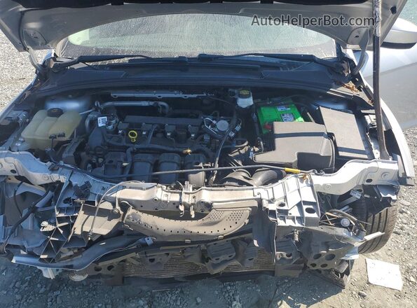 1FADP3F24JL250807 2018 FORD FOCUS Silver Rear interior view