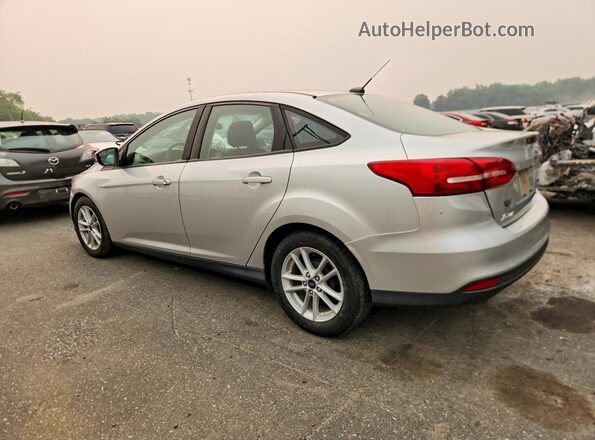 1FADP3F24JL264612 2018 FORD FOCUS Silver Trasero izquierdo