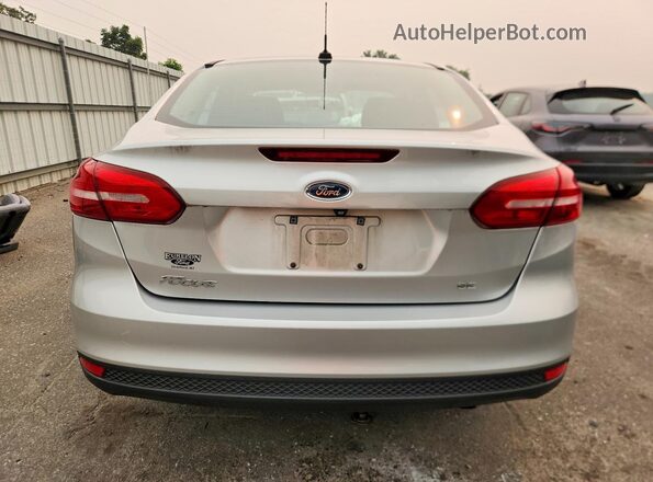 1FADP3F24JL264612 2018 FORD FOCUS Silver Vista trasera
