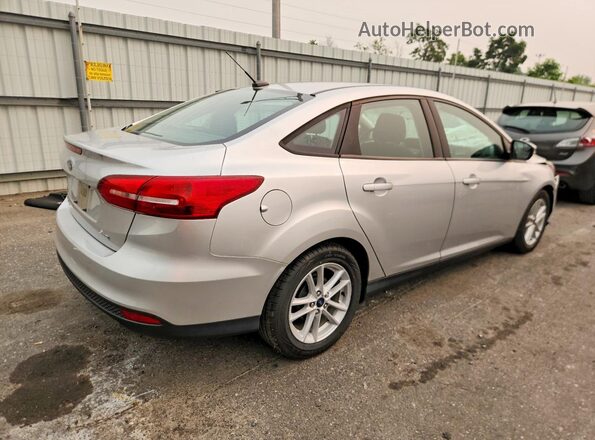 1FADP3F24JL264612 2018 FORD FOCUS Silver Trasero derecho
