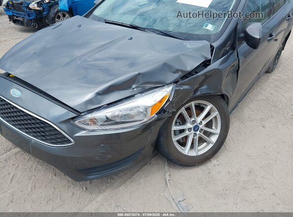 1FADP3F24JL329023 2018 FORD FOCUS Серый Вид спереди