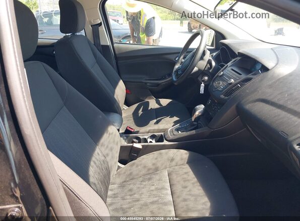 1FADP3F25GL371693 2016 FORD FOCUS Black Front interior view