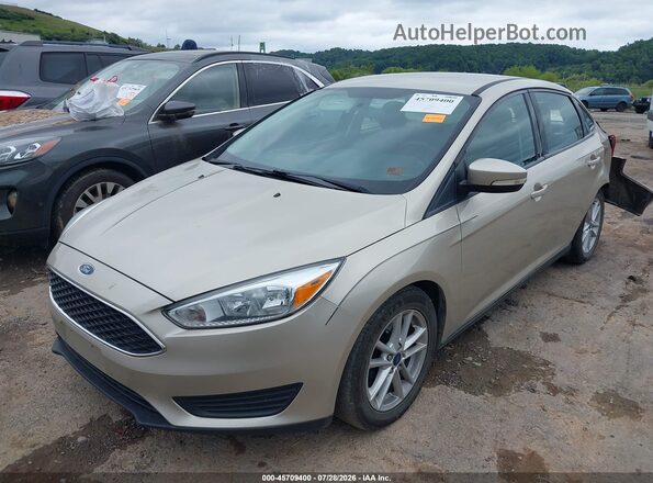 1FADP3F25HL213582 2017 FORD FOCUS Gold Vista tres cuartos delantera izquierda