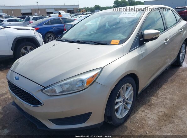 1FADP3F25HL329722 2017 FORD FOCUS Золотой Вид спереди