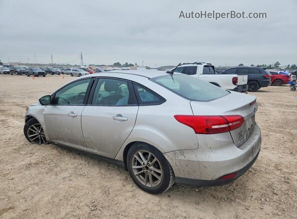 1FADP3F25JL272430 2018 FORD FOCUS Silver Trasero izquierdo
